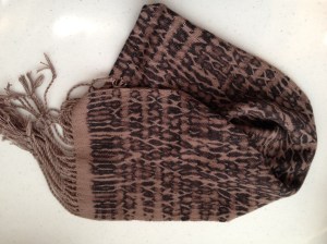 Close-up of a Handwoven Shibori Scarf, using bleach technique.