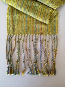 3 beads on each twisted fringe group.